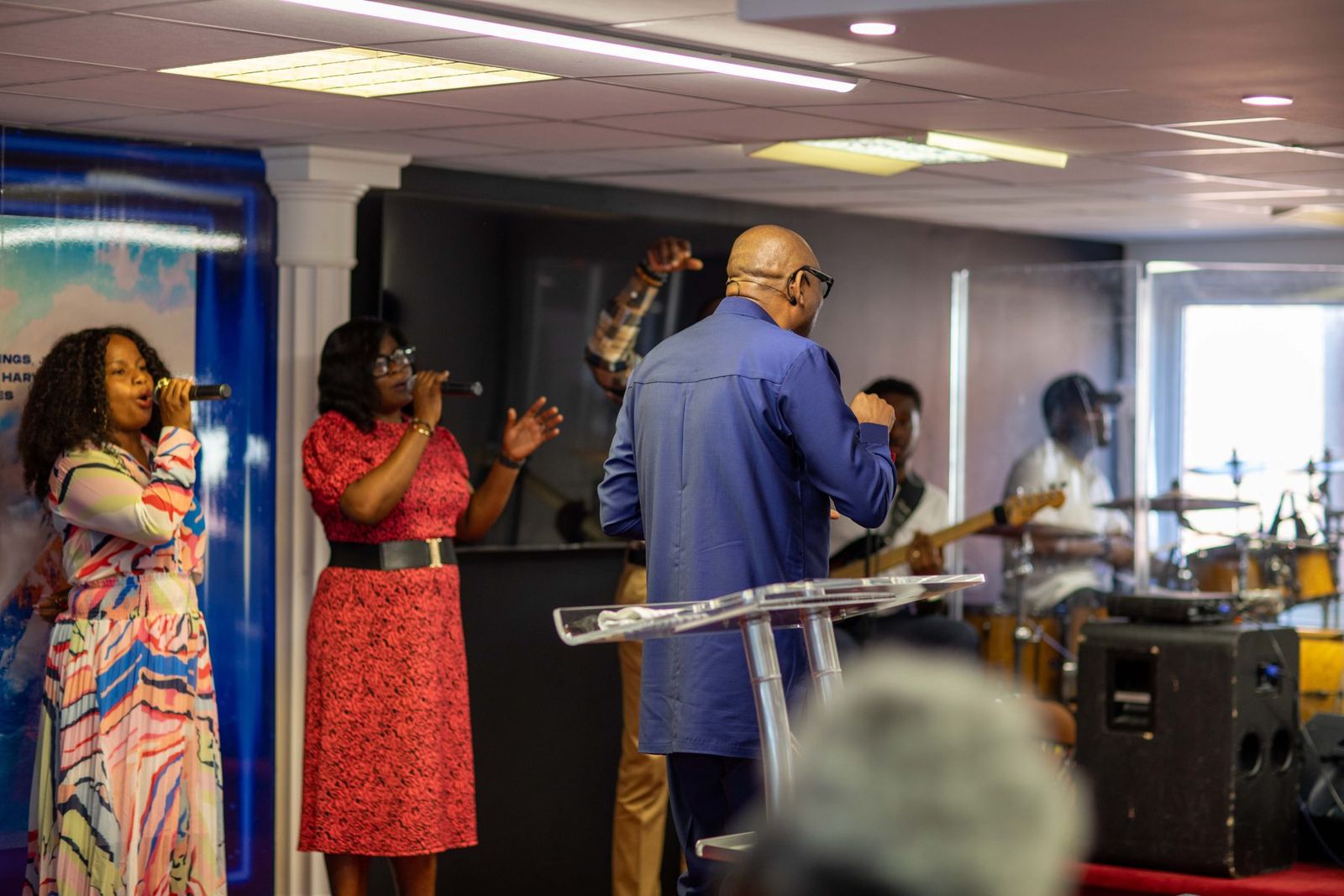 Worship team leading from the stage